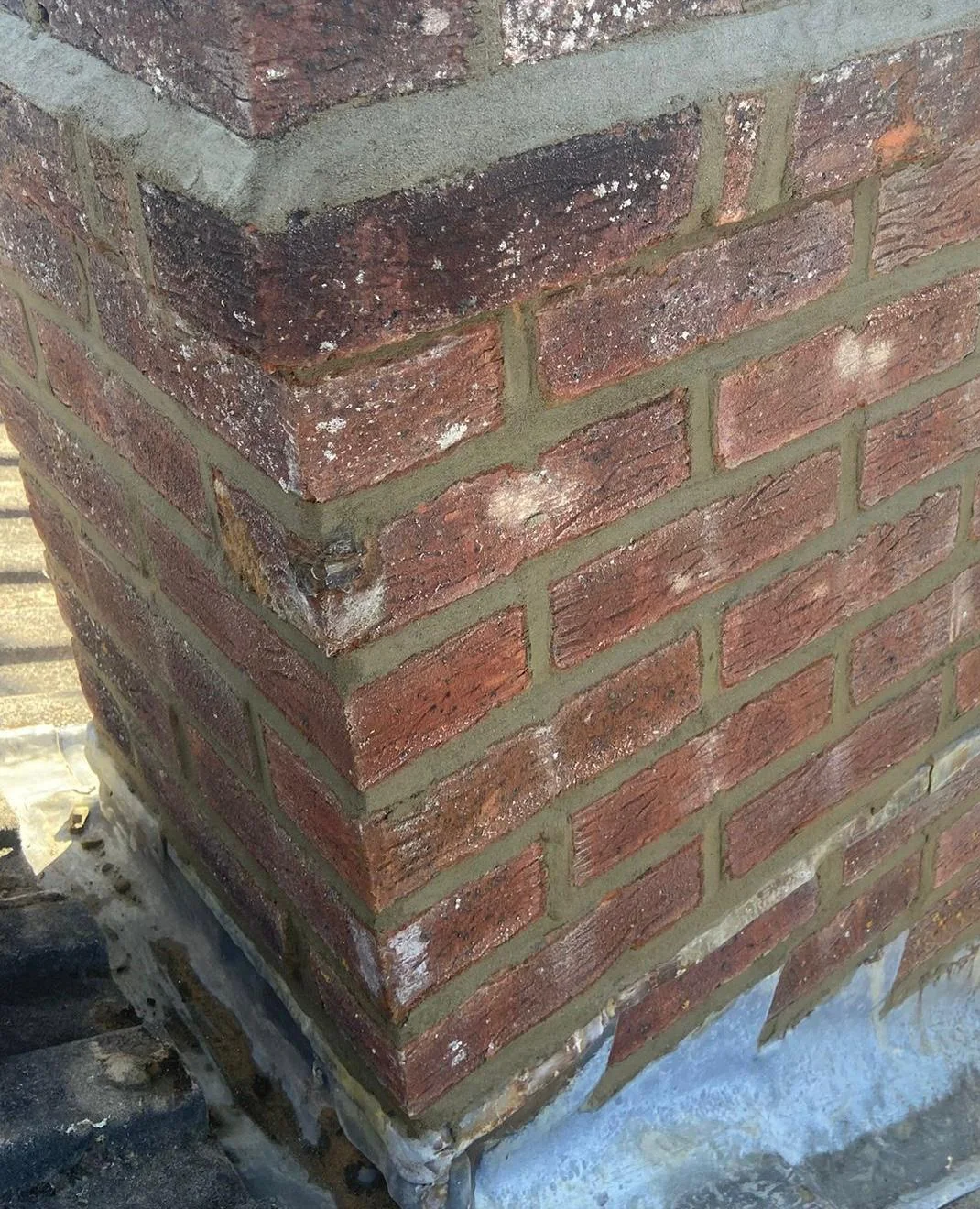 Chimney brickwork with renewed mortar joints