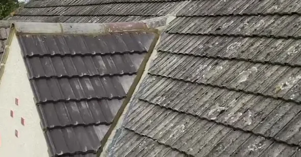 Tiled dormer roof slope and verge beside the main roof